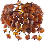 Многорядный плетеный браслет из шлифованных темных янтарных камней