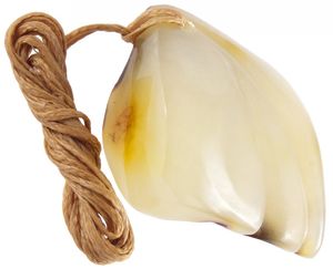 Кулон из светлого янтаря с резным оформлением