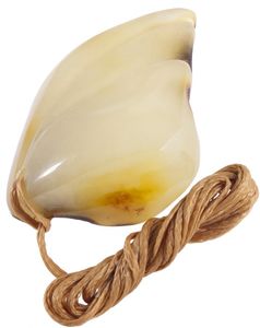 Кулон из светлого янтаря с резным оформлением