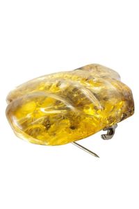 Брошь из массива светлого янтаря