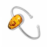 Жесткий браслет с камнем янтаря