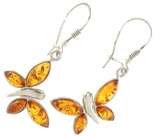 Сережки з камінням бурштину медового кольору «Метелики»