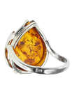 Серебряное кольцо с камнем янтаря «Загадка»