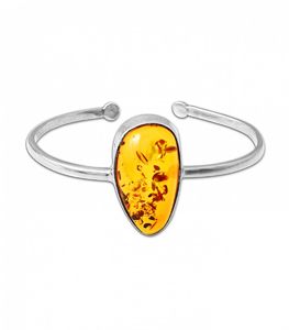 Жесткий браслет с камнем янтаря