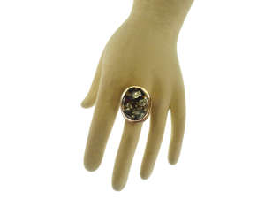 Кольцо из серебра и янтаря «Планета»