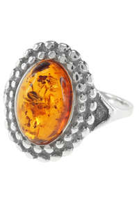 Серебряное кольцо с янтарным кабошоном «Делис»