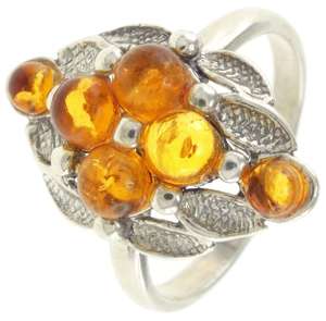 Срібний перстень з бурштиновими вставками медового кольору