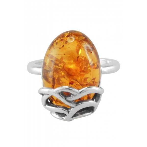 Серебряное узорчатое кольцо с янтарем «Волна»