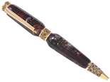 Шариковая ручка из темного янтаря с граненой поверхностью